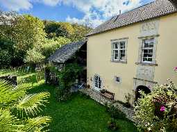 17C Maison de Maitre, set in an Attractive Courtyard with its Original Chai & Barns