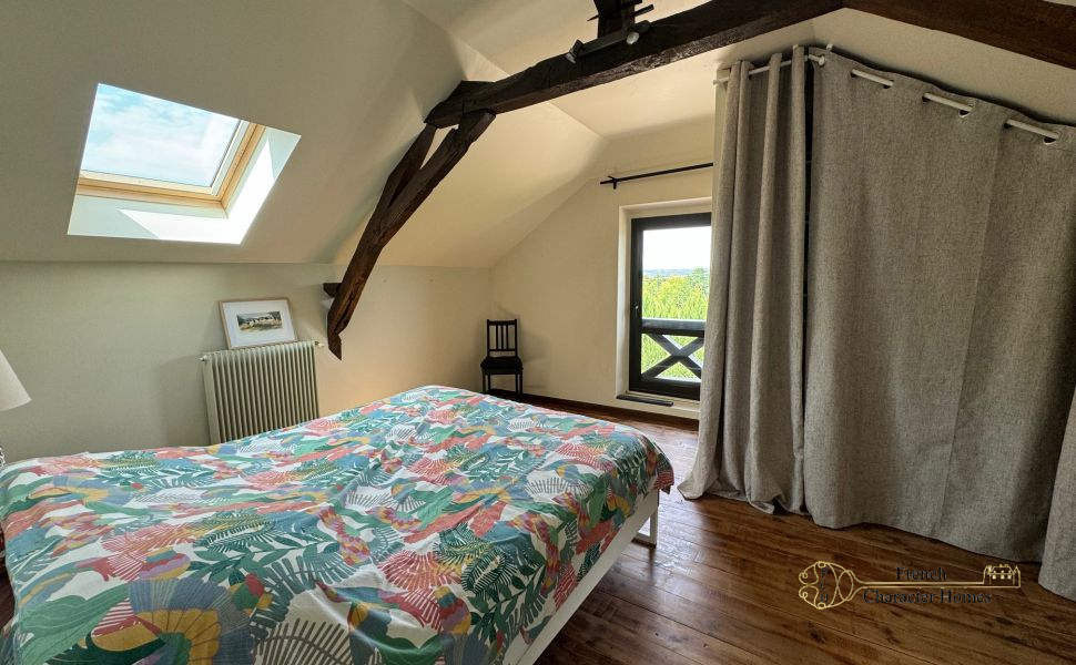 A Charming Farmhouse, with Barn & Pool, situated in Open Countryside on the edge of its Village