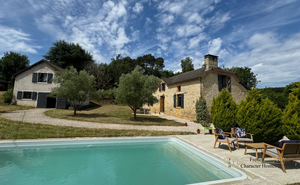 A Charming Farmhouse, with Barn & Pool, situated in Open Countryside on the edge of its Village