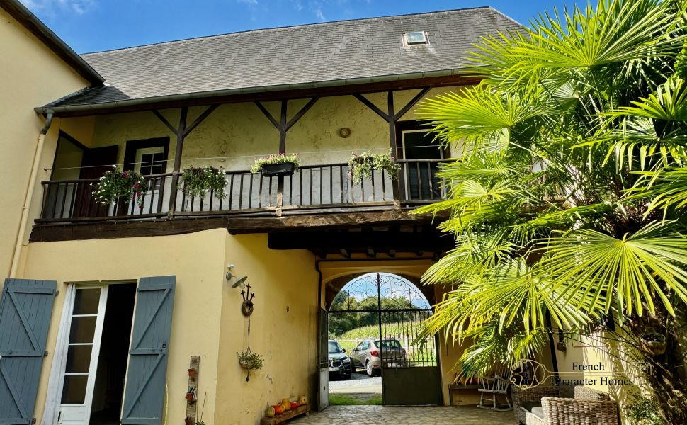 17C Maison de Maitre, set in an Attractive Courtyard with its Original Chai & Barns