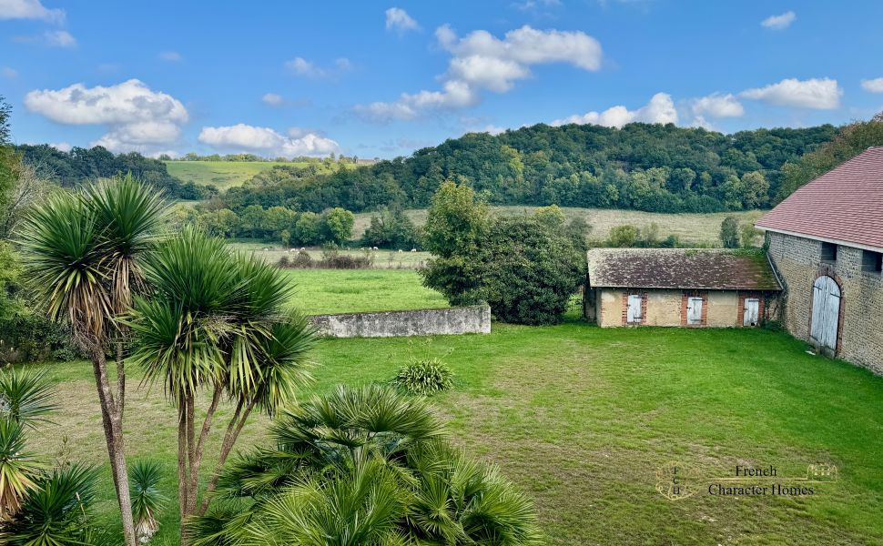 A Striking Maison de Maitre offering an Exceptional Restoration Opportunity!